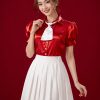 Áo sơ mi nữ đỏ đô trơn váy xếp ly trắng