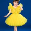 Đầm múa trẻ em nơ bướm vàng đầm bồng