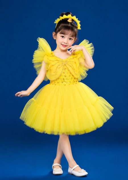 Đầm múa trẻ em nơ bướm vàng đầm bồng