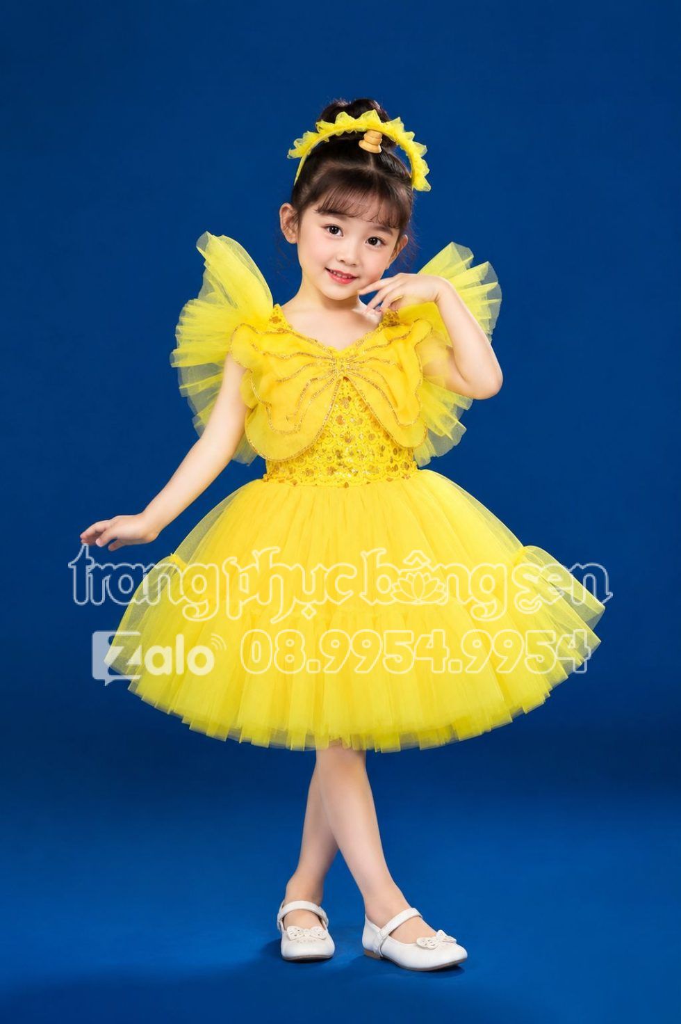 Đầm múa trẻ em nơ bướm vàng đầm bồng