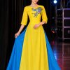 Thuê đồ biểu diễn áo dài hát múa màu vàng tay lửng kết hoa 3D