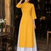 Thuê đồ văn nghệ áo dài lụa vàng đồng phối quần váy trắng