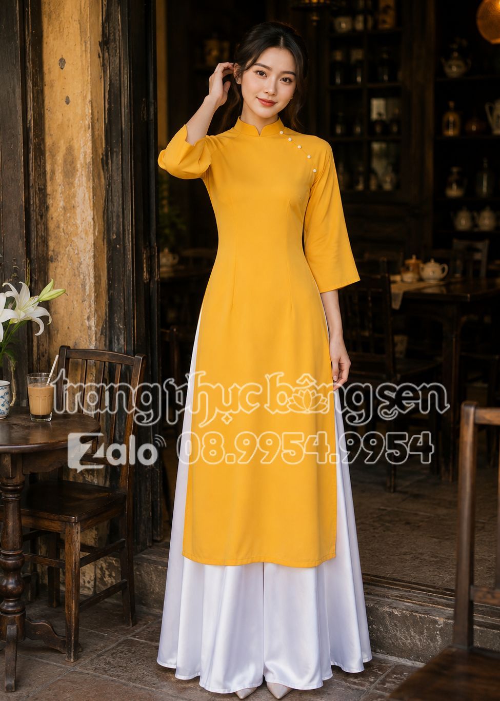 Thuê đồ văn nghệ áo dài lụa vàng đồng phối quần váy trắng
