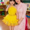 thuê váy múa trẻ em kim sa vàng bông to